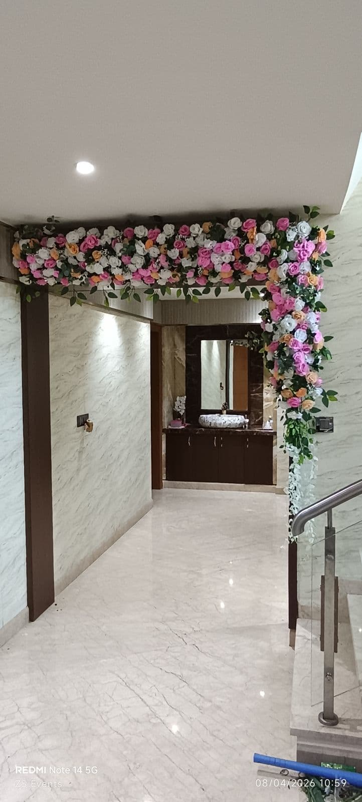 Floral frame over a hallway doorway for a home function