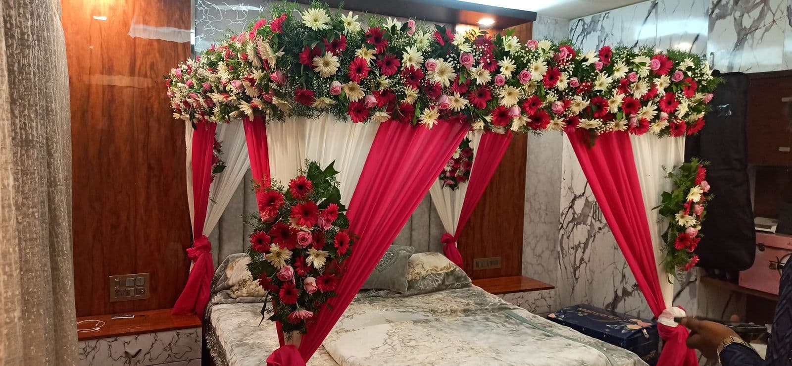 Red rose bed canopy with red and white drapes