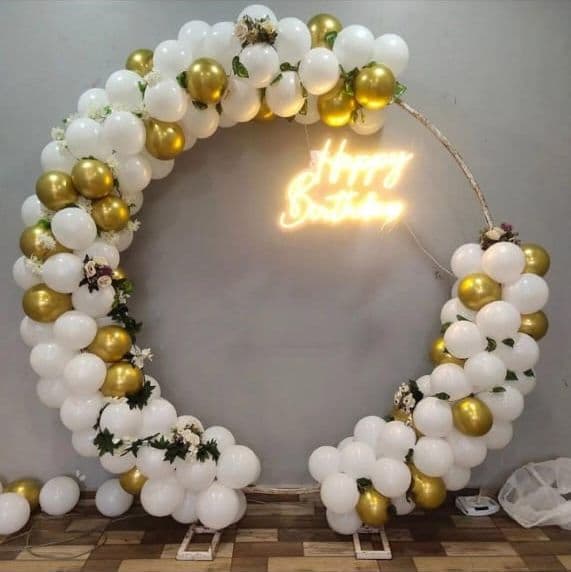 White and gold balloon ring with neon script sign